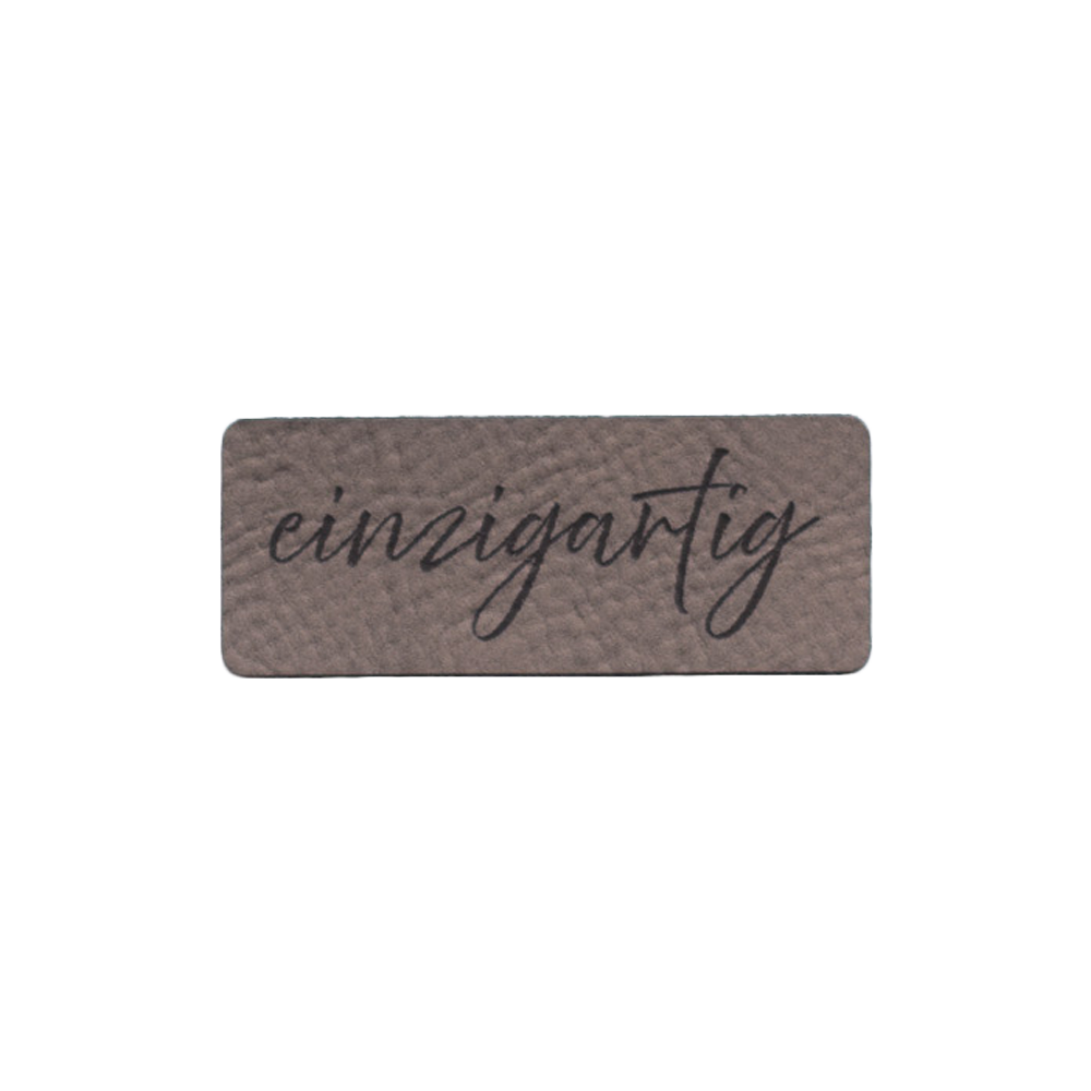 Kunstlederlabel "einzigartig"