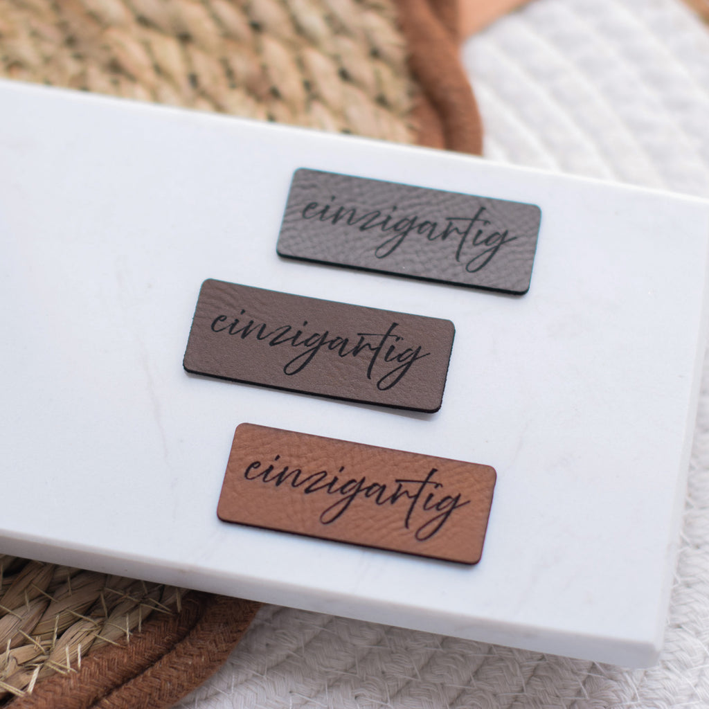 Kunstlederlabel "einzigartig"
