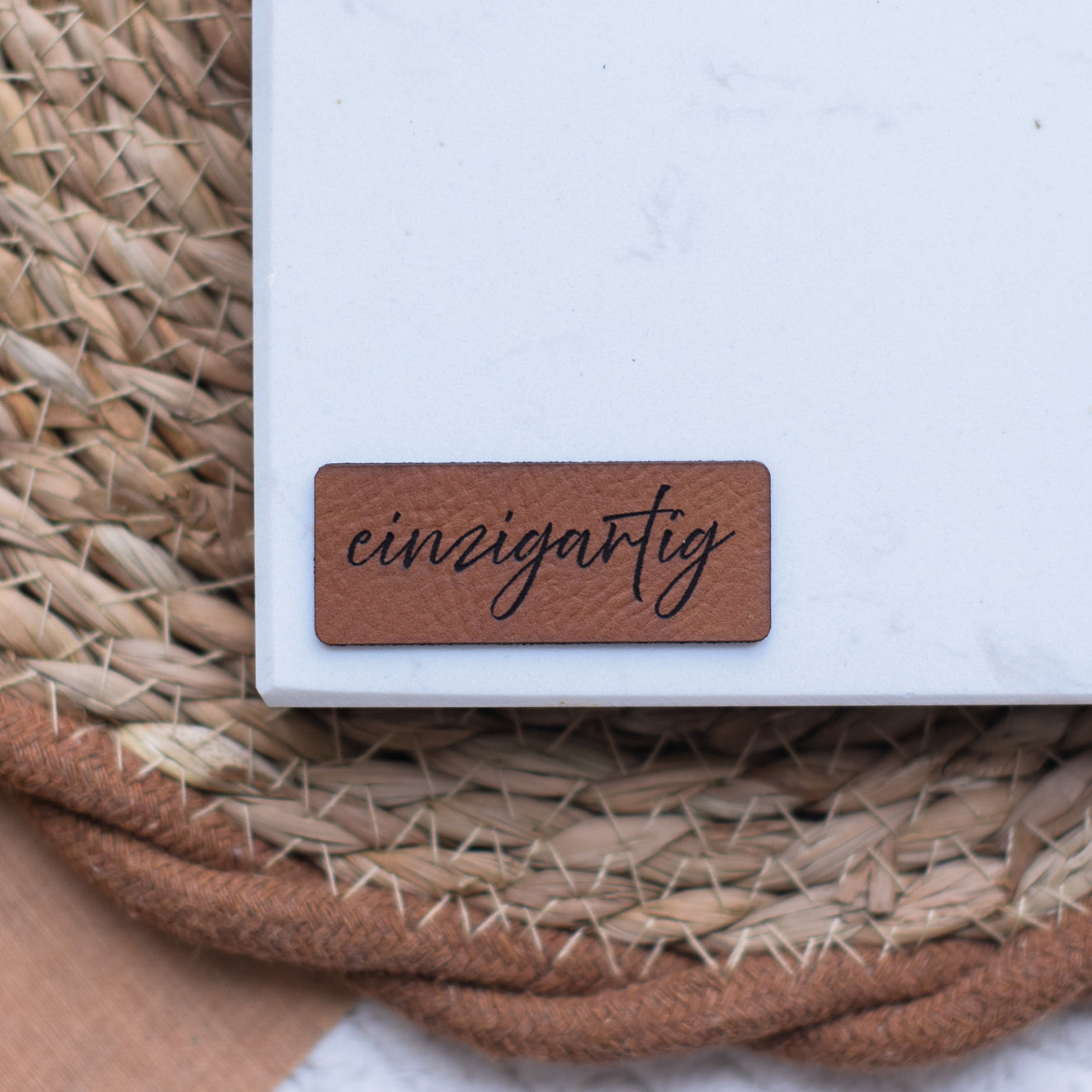 Kunstlederlabel "einzigartig"