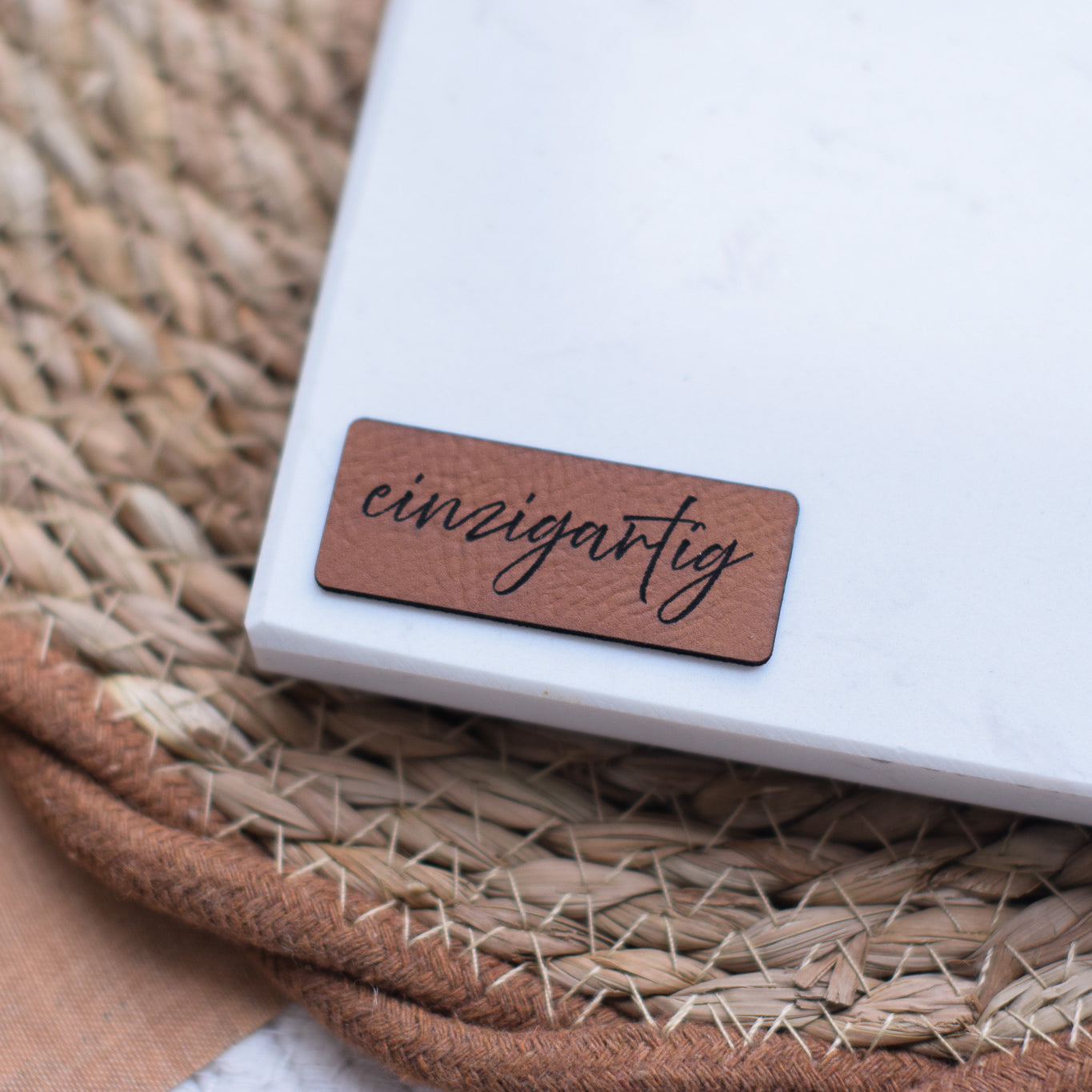 Kunstlederlabel "einzigartig"