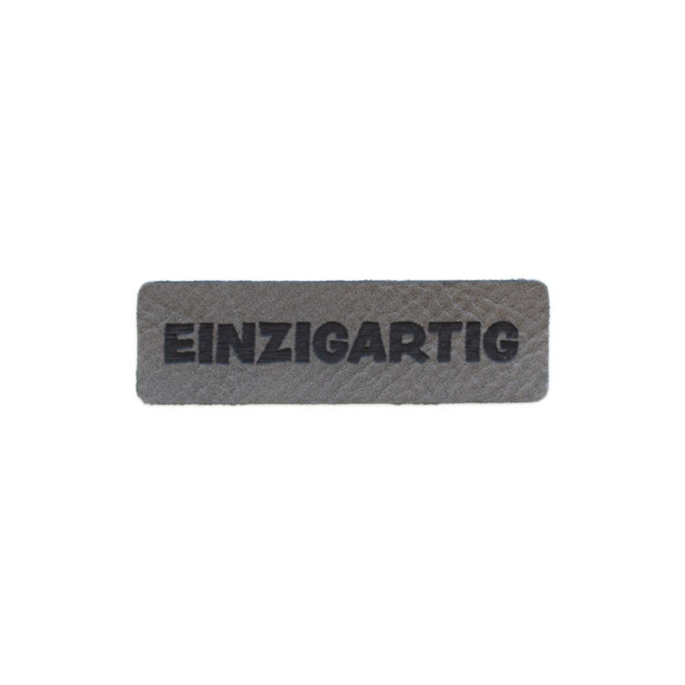 Kunstlederlabel "einzigartig"