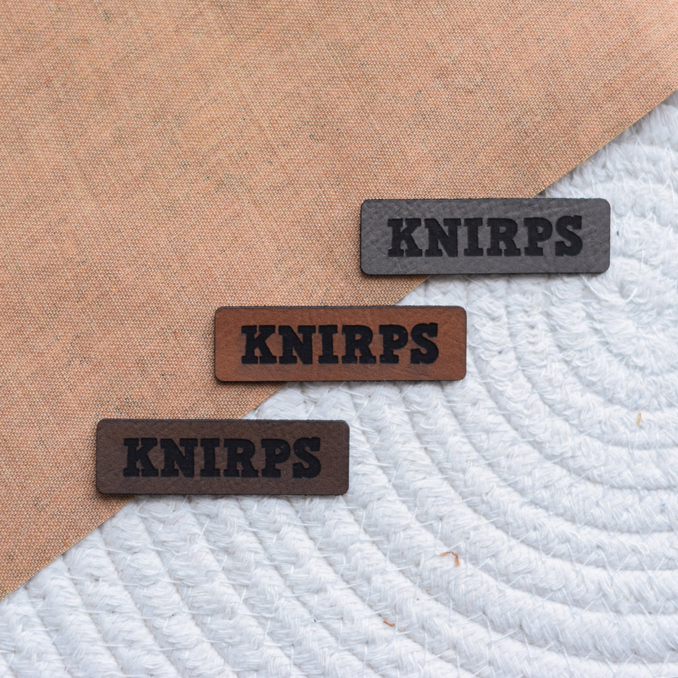 Kunstlederlabel "Knirps"