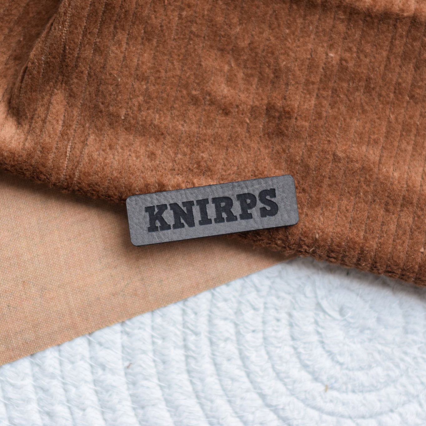 Kunstlederlabel "Knirps"