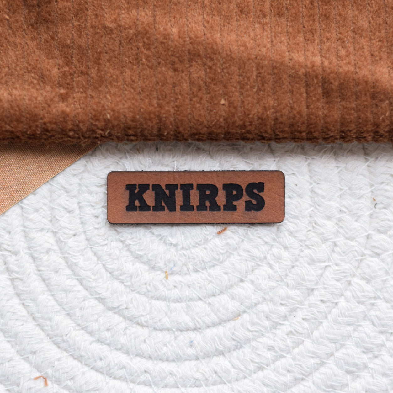 Kunstlederlabel "Knirps"