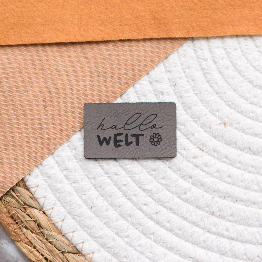 Kunstlederlabel "Hallo Welt - Blume"
