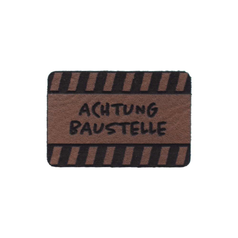 Kunstlederlabel "Achtung Baustelle"