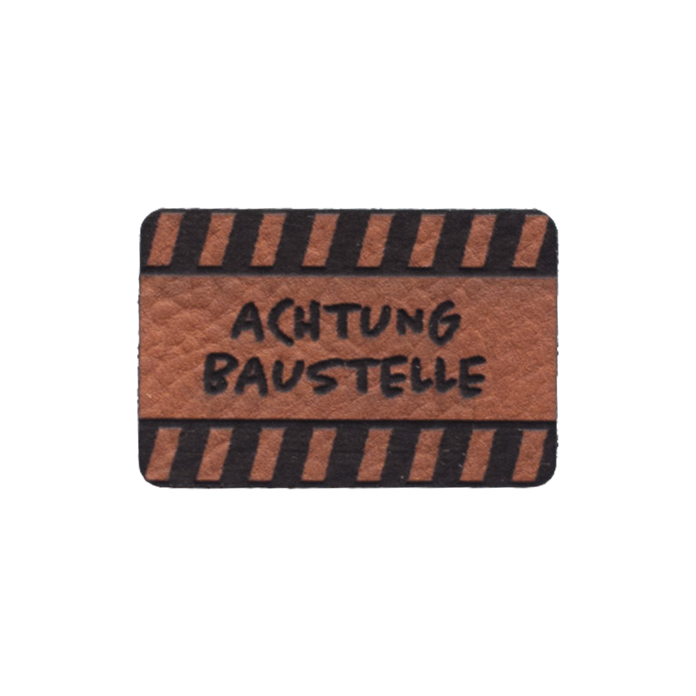 Kunstlederlabel "Achtung Baustelle"