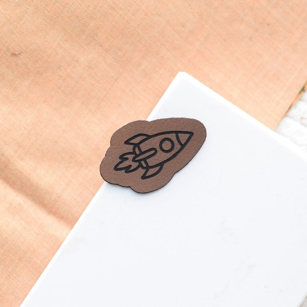 Kunstlederlabel "Rakete"