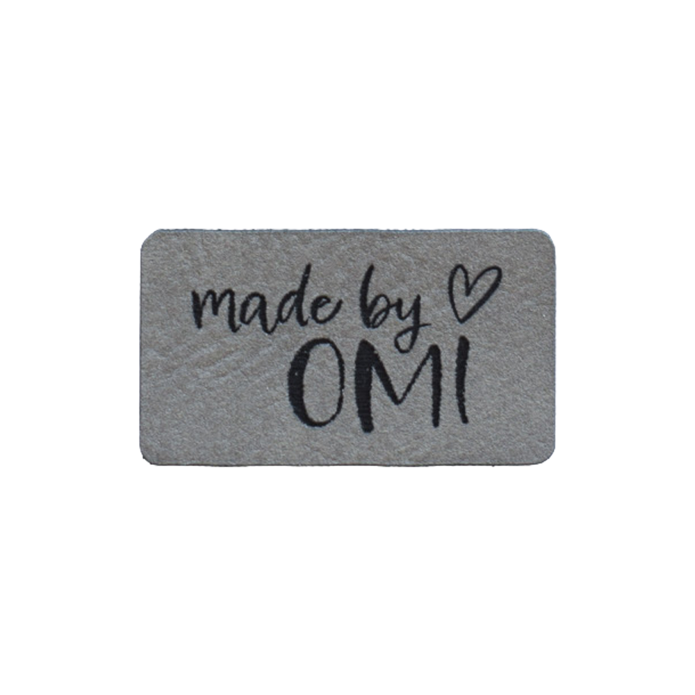 Kunstlederlabel "made by OMI"
