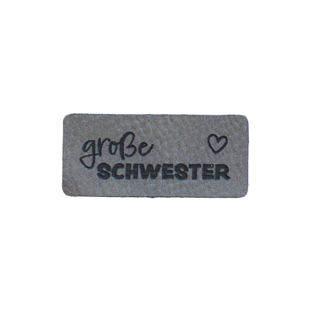 Kunstlederlabel "große Schwester"