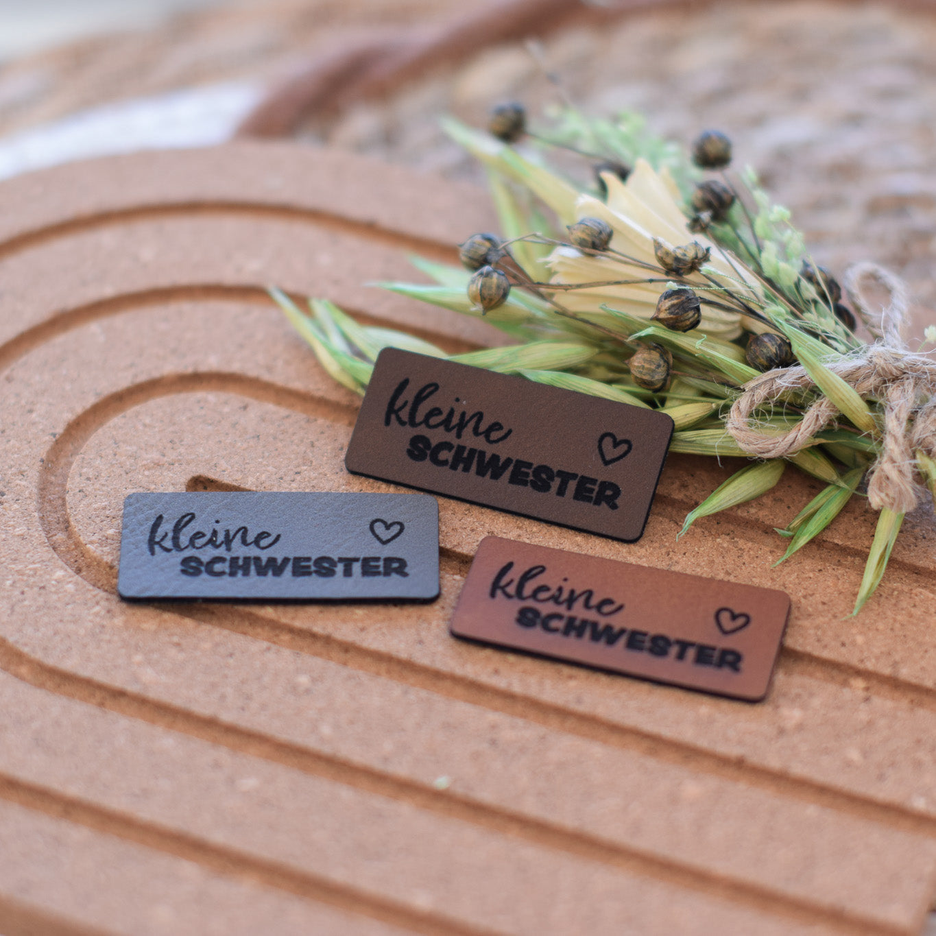 Kunstlederlabel "kleine Schwester"