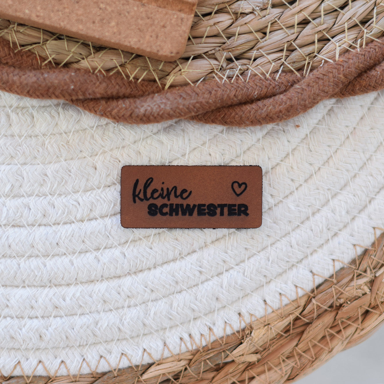 Kunstlederlabel "kleine Schwester"
