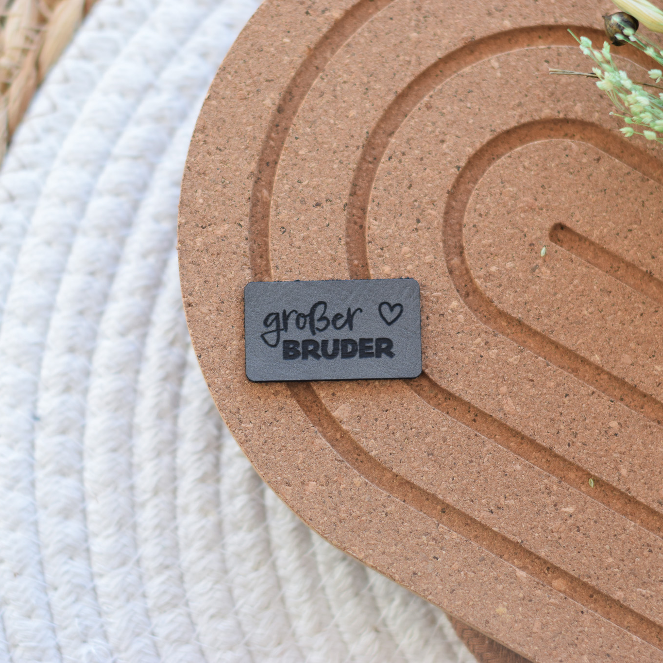 Kunstlederlabel "großer Bruder"
